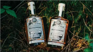  ?? ?? Odd Society’s Peat & Smoke whiskies started with peated malt from Scotland and the U.S.A.