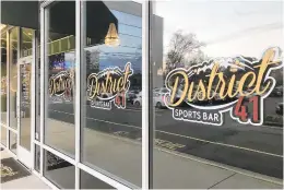  ?? MIKE HOLTZCLAW/STAFF ?? District 41 sports bar opened on New Year’s Eve on Pilot House Drive in Newport News.