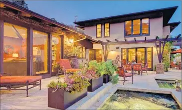  ?? Erik Grammer ?? TV WEATHERMAN Dallas Raines’ nearly 4,700-square-foot house in Pasadena is listed at $3.498 million.
