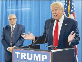  ?? REUTERS ?? Photo taken on Jan. 26, 2016 shows US President Donald Trump after being endorsed by Maricopa County Sheriff Joe Arpaio before a campaign rally in Iowa.