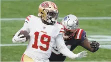  ?? Steven Senne / Associated Press ?? Deebo Samuel had five receptions for 65 yards and gained 7 yards on three carries at New England on Sunday.