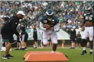  ?? MIKEY REEVES – FOR MEDIANEWS GROUP ?? Eagles running back Miles Sanders goes through a drill Sunday evening at Lincoln Financial Field.
