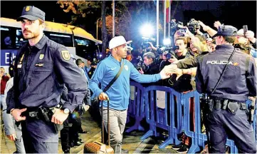  ??  ?? Carlos Tevez arrived in Madrid with the rest of his Boca Juniors team-mates on Wednesday. - AFP photo