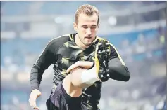  ?? — AFP photo ?? Tottenham Hotspur’s Harry Kane warms up before the UEFA Champions League group H match against Real Madrid at the Santiago Bernabeu stadium in Madrid, in this Oc 17 file photo.