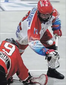  ?? CLIFFORD SKARSTEDT EXAMINER ?? Peterborou­gh Century 21 Lakers’ Jake Withers wins the faceoff against Brooklin Redmen’s Mitch McMichael during first period of Semifinals Game 6 of Major Series Lacrosse action on Aug. 15 at the Iroquois Park Arena in Whitby. Withers has signed a two-year deal with the NLL’s Rochester Knighthawk­s.