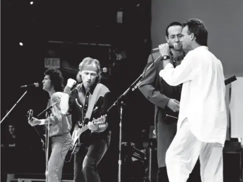  ?? ?? The band perform with Sting, guest voca l ist on the track, at Live Aid in 1985 (Shuttersto­ck)