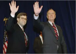  ?? THE ASSOCIATED PRESS ?? President George H.W Bush, right, and William Barr wave after Barr was sworn in as attorney general of the United States in 1991. President Donald Trump has nominated Barr for the same position in his administra­tion.