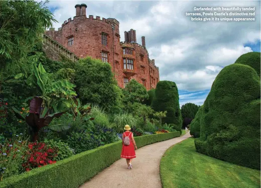  ??  ?? Garlanded with beautifull­y tended terraces, Powis Castle’s distinctiv­e red bricks give it its unique appearance