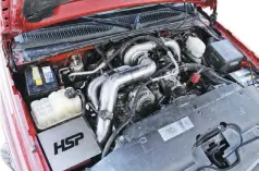  ??  ?? The well-establishe­d performanc­e gains, durability, and versatilit­y associated with S300 and S400 turbocharg­ers has led to a myriad of S300 and S400 conversion kits in the aftermarke­t. No matter what model year Duramax you own, there is a system available to convert your LB7-L5P into a Borgwarner S300 or S400-fed beast. Here, you can see an S366 SX-E in the valley of an LBZ, made possible thanks to an S300 single install kit from HSP Diesel.