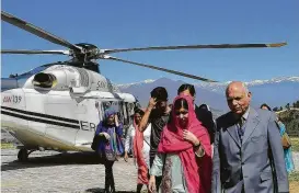  ?? Abdul Majeed / AFP / Getty Images ?? Malala Yousufzai, the youngest Nobel laureate, arrives in Mingora, Pakistan, on Saturday for her first return to the formerly militant-infested region where she was shot in the head by the Taliban more than five years ago while on a school bus.