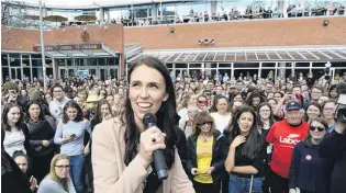  ?? PHOTO: GERARD O’BRIEN ?? Causing a stir . . . Labour leader Jacinda Ardern speaks to a crowd outside the University of Otago Student Union.