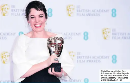  ??  ?? Olivia Colman with her Best Actress award in a leading role for The Favourite at the 72nd British Academy Film Awards at the Royal Albert Hall