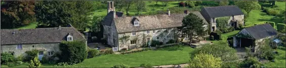  ??  ?? Cottage garden idyll: An aerial view of Miss Allen’s six-bedroom home in the Cotswolds, including the barns and some of the 7.5 acres of land