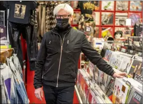  ?? LEONARD ORTIZ, ORANGE COUNTY REGISTER/SCNG ?? William Evans, owner of Black Hole Records, at his store on Feb. 17.