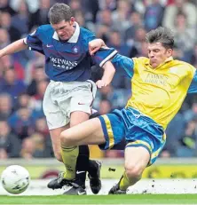  ??  ?? Jim Weir, right, playing against Rangers in 1998.