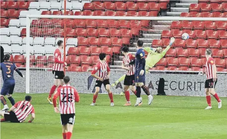  ??  ?? Sunderland goalkeeper Lee Burge can only try to save Sullay Kaikai’s wonder shot. Pictures by Frank Reid.