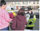  ??  ?? TRIBUTES Flowers left in Clondalkin