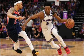  ?? (AP file photo) ?? De’Aaron Fox, who averaged 21.1 points last season, and the Sacramento Kings agreed on a fiveyear, $163 million deal Friday on the opening night of free agency.