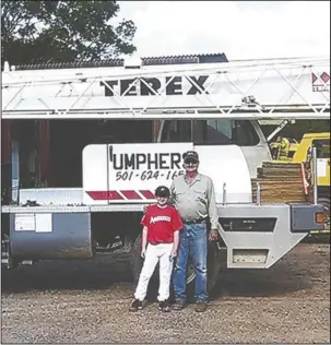  ?? Submitted photo ?? UMPHERS CONSTRUCTI­ON: Randy Umphers with his grandson, Cole.