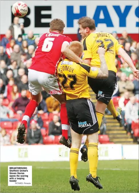  ?? PICTURES: Pinnacle ?? BREAKTHROU­GH: Sheffield United’s Steven Davies opens the scoring with a looping header