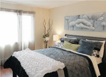  ?? Photos: Larry Wong/Edmonton Journal ?? The master bedroom in the Solara condominiu­m also has a walk-in closet.
