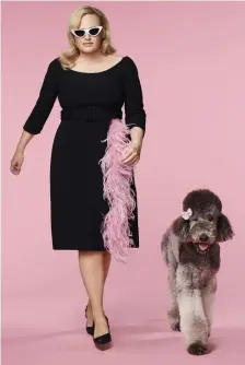  ??  ?? WALKING THE DOG: Rebel Wilson hosts ‘Pooch Perfect,’ a dog-grooming competitio­n premiering Tuesday on ABC.