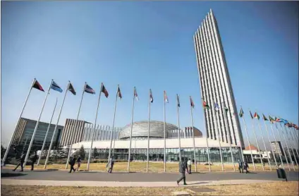  ?? Photos: Tiksa Negeri/Reuters and Simon maina/AFP ?? Granting impunity: The summit at AU headquarte­rs (above) in Addis Ababa adopted a strategy to withdraw from the ICC. The case against Kenyan President Uhuru Kenyatta, charged with crimes against humanity, was dropped after a key witness refused to...