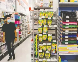  ?? COLE BURSTON / THE CANADIAN PRESS ?? Retailers are banking on a robust back-to-school shopping season as students gear up
to return to in-classroom learning — many for the first time in more than a year.