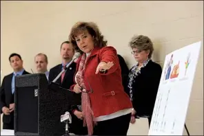  ?? Arkansas Democrat-Gazette/STATON BREIDENTHA­L ?? Beverly Williams of the Sherwood Public Education Foundation said Wednesday that her group is undecided about opposing a desegregat­ion plan that would block a separate Sherwood school district.