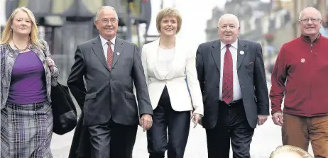  ??  ?? Politician John Swinburne MSP (second from left) in Hamilton during the independen­ce referendum campaign with the town’s MSP, Christine Mckelvie MSP, Nicola Sturgeon, Alex Mosson and Dennis Canavan