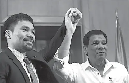  ?? / RAPPLER.COM ?? ■ DASIG: Mas nagmadasig­on si Manny Pacquiao (wa) sa iyang umaabot nga dakong away human niya nasayran nga personal nga mosaksi si Presidente Rodrigo Duterte.