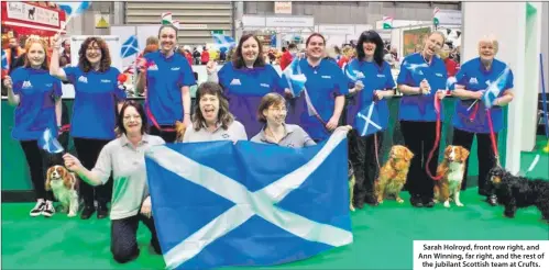  ??  ?? Sarah Holroyd, front row right, and Ann Winning, far right, and the rest of the jubilant Scottish team at Crufts.