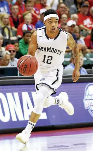  ?? AP FILE ?? Monmouth guard and Kingston High graduate Justin Robinson earned the Lou Henson National Player of the Year, given to the top mid-major player in the nation.