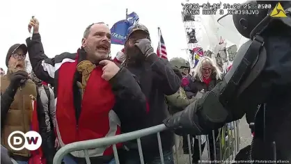  ?? ?? Thomas Webster, in red, can be seen in police body cam footage participat­ing in the riot