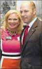  ?? CONTRIBUTE­D BY PHIL SKINNER ?? Hunter Hill, a Republican candidate for governor, poses with Marci McCarthy at his election night party Tuesday at the Atlanta Marriott Northwest at Galleria in Atlanta.