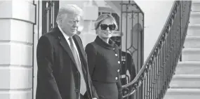  ?? ALEX BRANDON/AP ?? President Donald Trump and first lady Melania Trump leave the White House for the last time in his term Wednesday.