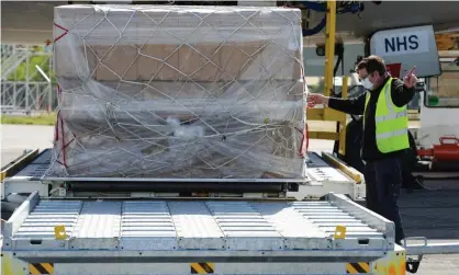  ??  ?? Boxes of face masks are unloaded from a plane. Some services overseen by councils are outside the NHS supply chain. Photograph: Finnbarr Webster/Getty Images