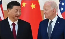  ?? Loeb/AFP/Getty Images ?? Xi Jinping and Joe Biden meet on the sidelines of a G20 Summit in Bali. Photograph: Saul