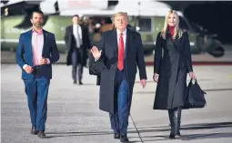  ?? MANDEL NGAN/GETTY-AFP ?? Then-president Trump, daughter Ivanka Trump and son Donald Trump Jr. make their way to Air Force One last January. The three have been subpoenaed.