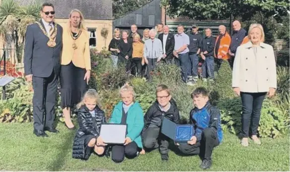  ??  ?? Washington Village in Bloom volunteers celebratin­g winning Northumbri­a in Bloom Best Village in 2019.