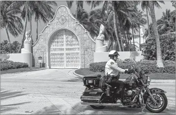  ?? Giorgio Viera
/ AFP via Getty Images /TNS ?? Local law enforcemen­t officers are seen in front of the home of former President Donaldtrum­p at Mar-a-lago in Palm Beach, Florida ontuesday. Trump said on Monday that his Mar-a-lago residence in Florida was being “raided” by FBI agents in what he called an act of “prosecutor­ial misconduct.”