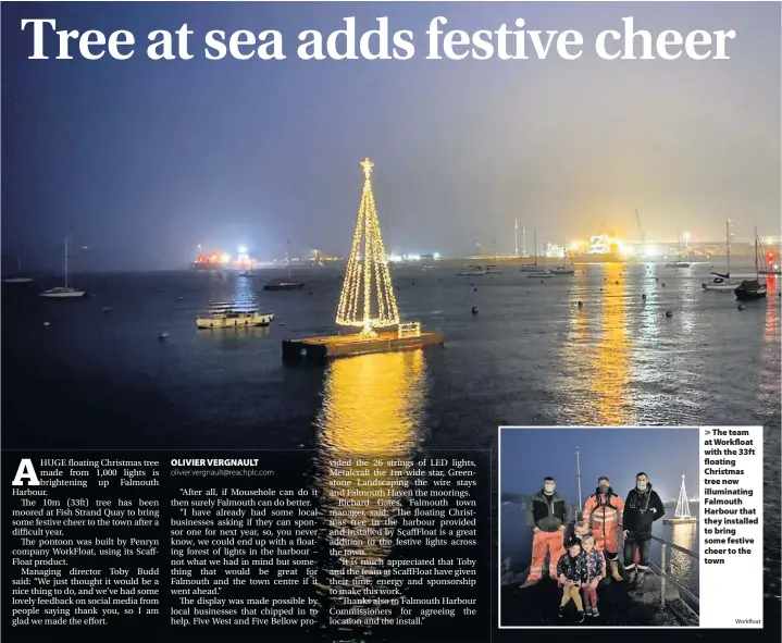  ??  ?? > The team at Workfloat with the 33ft floating Christmas tree now illuminati­ng Falmouth Harbour that they installed to bring some festive cheer to the town