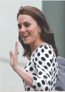  ??  ?? BRITAIN’S Catherine, Duchess of Cambridge waves as she arrives at The All England Lawn Tennis Club in Wimbledon, London, on July 3.