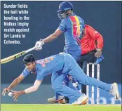  ??  ?? Sundar fields the ball while bowling in the Nidhas trophy match against Sri Lanka in Colombo.