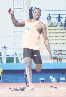  ??  ?? Flashback-Athletics star Emanuel Archibald achieving his personal best in the long jump at the recently concluded Guyana National Track and Field Championsh­ip.