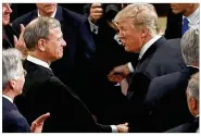  ?? AP 2017 ?? President Donald Trump, with Chief Justice John Roberts before a speech to a joint session of Congress on Feb. 28, 2017, responded Wednesday to Roberts that “you do indeed have ‘Obama judges.’ ”
