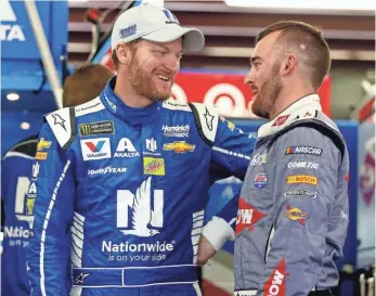  ?? SEAN GARDNER, GETTY IMAGES ?? Austin Dillon, right, hopes that some of the legions of fans of Dale Earnhardt Jr., left, head his way when the NASCAR legend retires. “He’s a hero of the sport,” Dillon says.