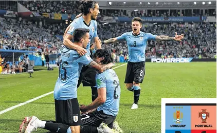  ?? REUTERS ?? Festejo charrúa. Cavani (arrodillad­o), Vecino, Cáceres y Nández celebran el gol uruguayo.