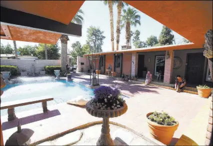  ??  ?? The pool is in the front yard of this 1969 Hollywood Regency style home in Las Vegas.