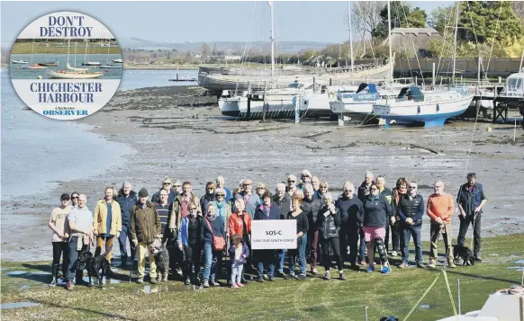  ??  ?? Libby Alexander from SOS-C, centre, with John Nelson, chairman of Chichester Harbour Trust, and concerned residents at Dell Quay